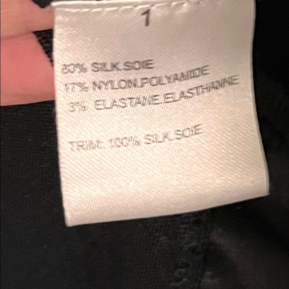 Light weight sweater with satin ribbon over chest, low cut and form fitting. - Picture 3 of 5